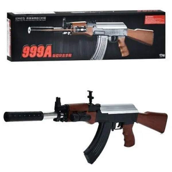 Автомат 999A (12шт) 71см, пластикові кулі, лазер, на бат(табл), в кор-ці, 76-21-6,5см (шт)