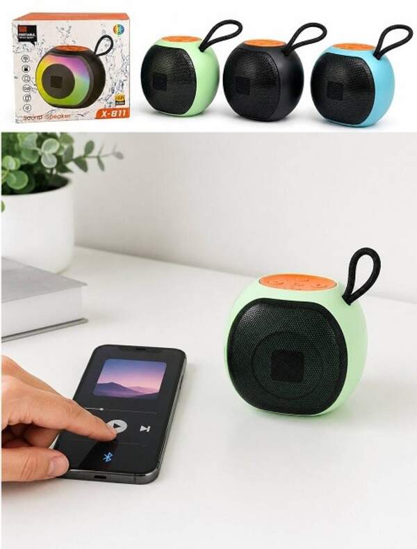 Колонка USB бездротова портативна кругла. з ручкою в кол. бум. кор.(10*10*11)см №Х-811 (50) (шт)